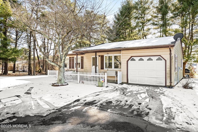 single story home with a garage