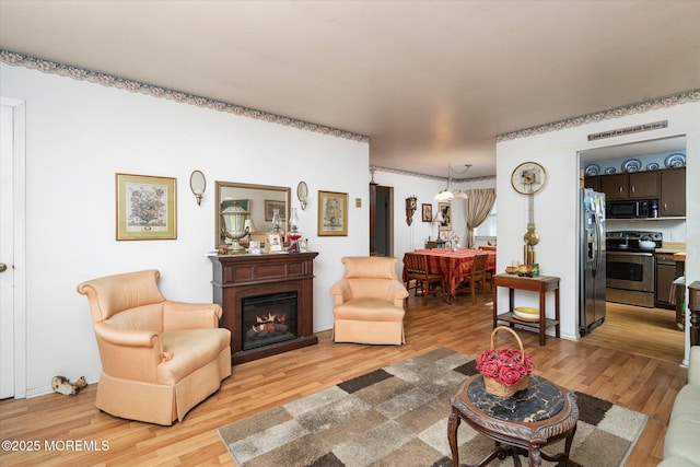 living room featuring light hardwood / wood-style floors