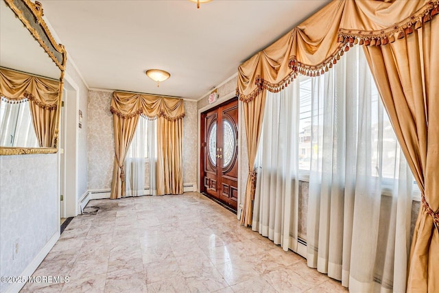 entrance foyer with a baseboard radiator and crown molding