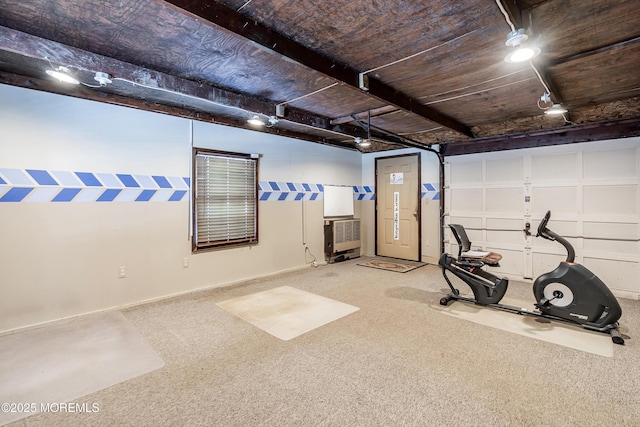 workout area featuring carpet flooring