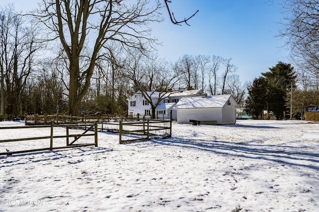 view of yard covered in snow