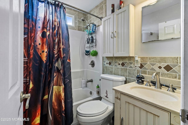 full bathroom featuring tasteful backsplash, vanity, toilet, and shower / bath combo with shower curtain