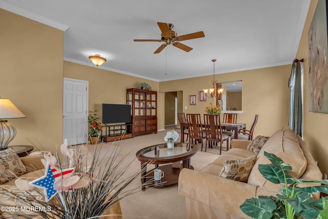 carpeted living room with ornamental molding and ceiling fan with notable chandelier