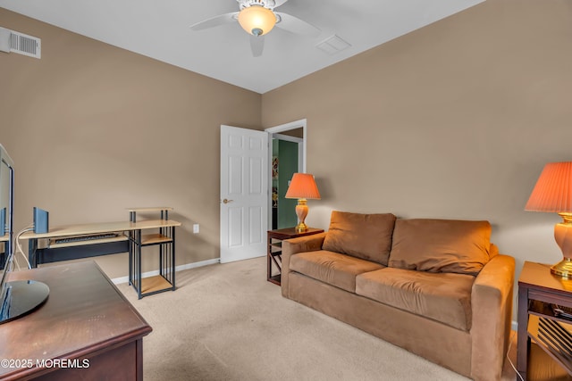 carpeted living room featuring ceiling fan