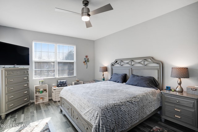 bedroom featuring ceiling fan and dark hardwood / wood-style floors