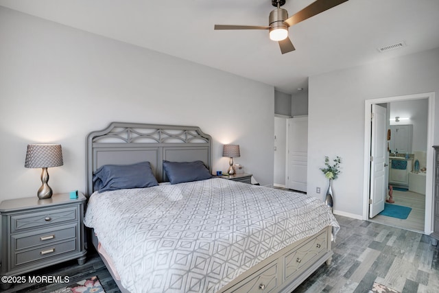 bedroom featuring ceiling fan, ensuite bath, and hardwood / wood-style flooring