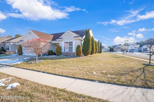 view of front facade with a front yard