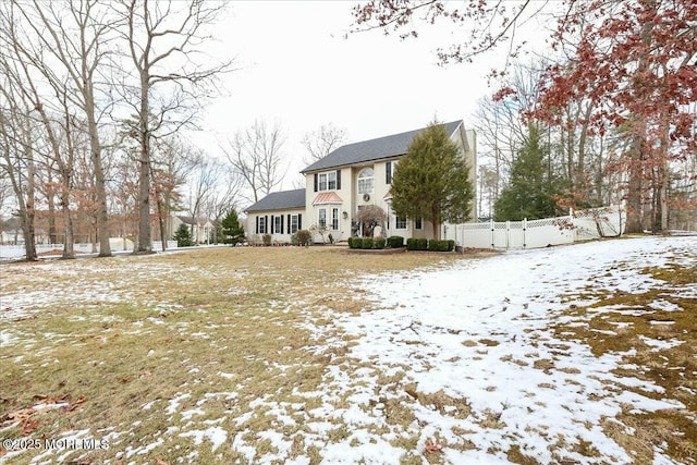 view of front of house with fence