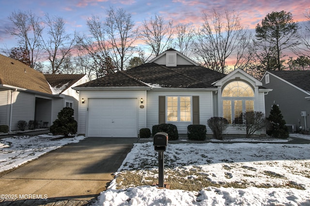 view of front of house featuring central AC unit and a garage