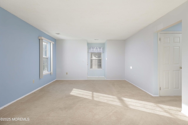 view of carpeted spare room