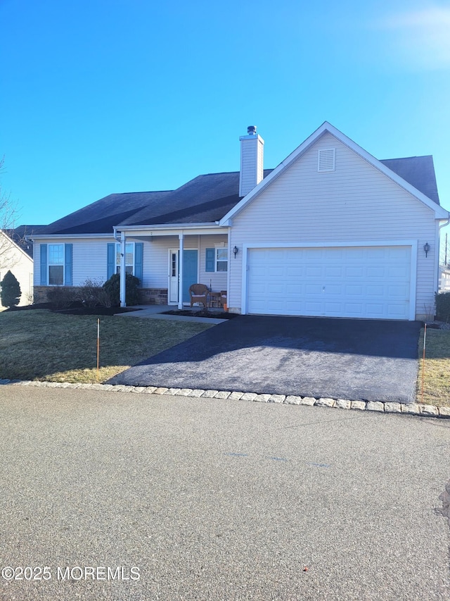 single story home featuring a garage