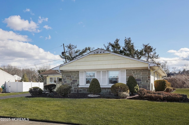 view of front of home with a front yard