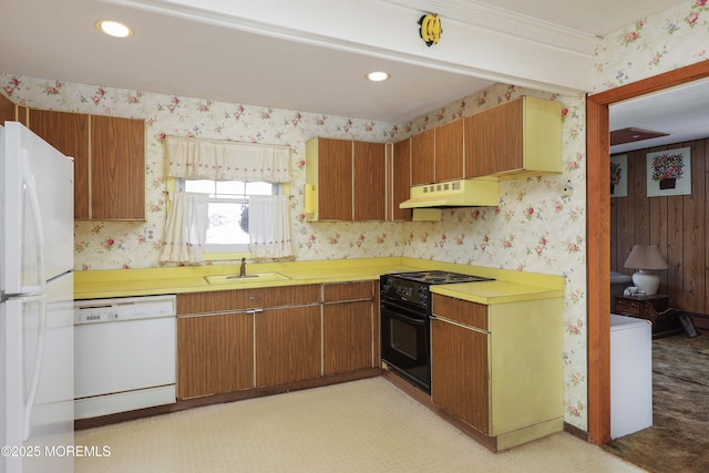 kitchen featuring sink and white appliances