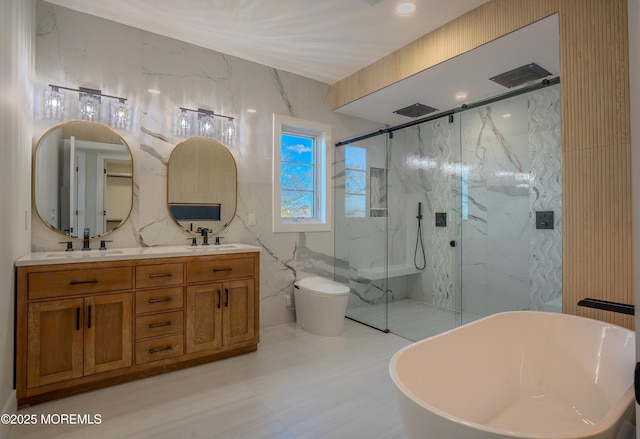 full bathroom featuring tile walls, vanity, toilet, and separate shower and tub