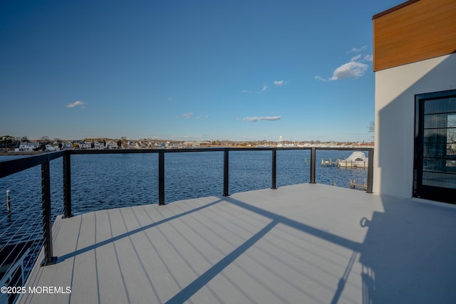 dock area with a water view