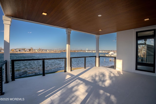 view of patio / terrace with a water view