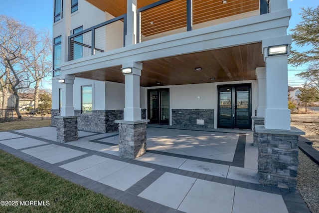 view of exterior entry with french doors