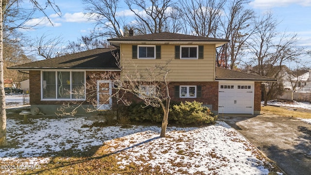 split level home featuring a garage