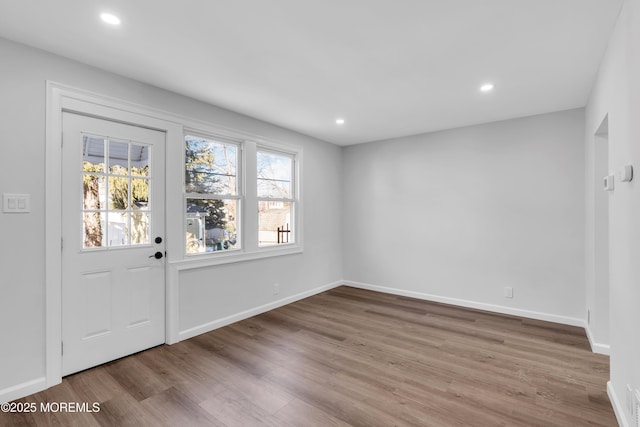 foyer with hardwood / wood-style flooring