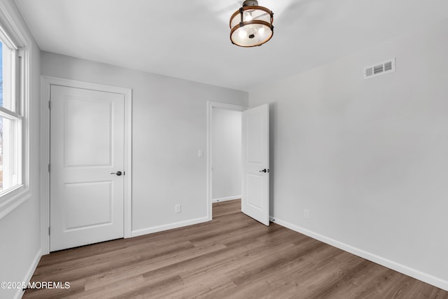 unfurnished bedroom featuring light hardwood / wood-style floors