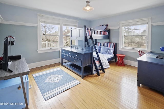 bedroom with light wood-type flooring