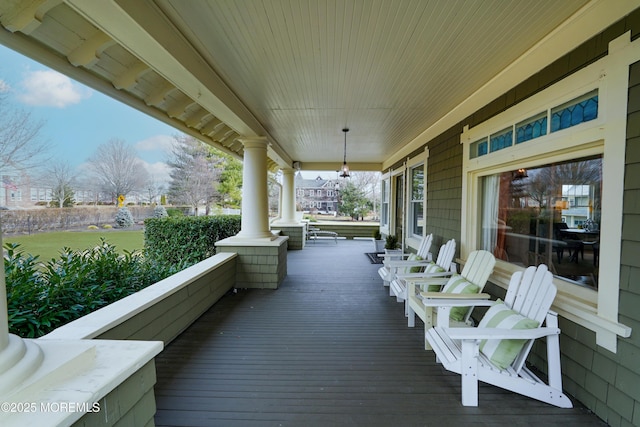 wooden terrace featuring a porch