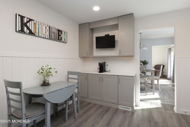 dining area with dark hardwood / wood-style flooring