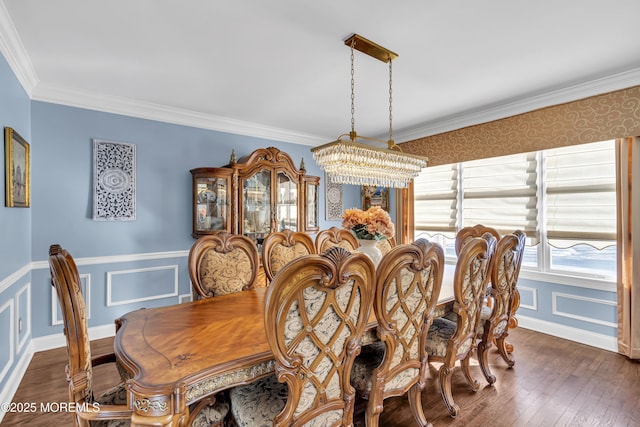 9 Mehar Ct, Jackson, NJ 08527 - dining room featuring crown molding, dark wood-style flooring, a chandelier, a wainscoted wall, and a decorative wall