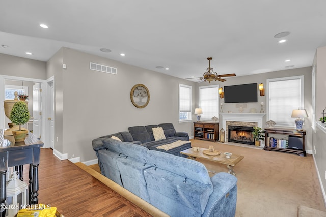 9 Mehar Ct, Jackson, NJ 08527 - living room featuring baseboards, ceiling fan, a stone fireplace, recessed lighting, and wood finished floors