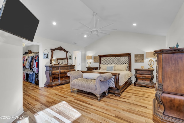 9 Mehar Ct, Jackson, NJ 08527 - bedroom with vaulted ceiling, light wood finished floors, a walk in closet, a closet, and a ceiling fan