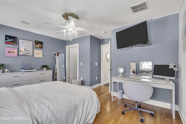 9 Mehar Ct, Jackson, NJ 08527 - bedroom featuring baseboards, light wood-style flooring, a ceiling fan, and an office area