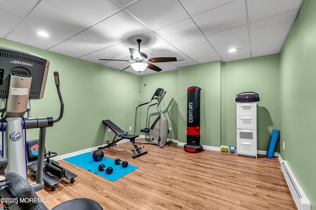 9 Mehar Ct, Jackson, NJ 08527 - workout room with a baseboard heating unit, a ceiling fan, baseboards, wood finished floors, and recessed lighting