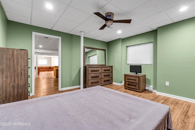 9 Mehar Ct, Jackson, NJ 08527 - bedroom featuring baseboard heating, wood finished floors, a drop ceiling, baseboards, and recessed lighting