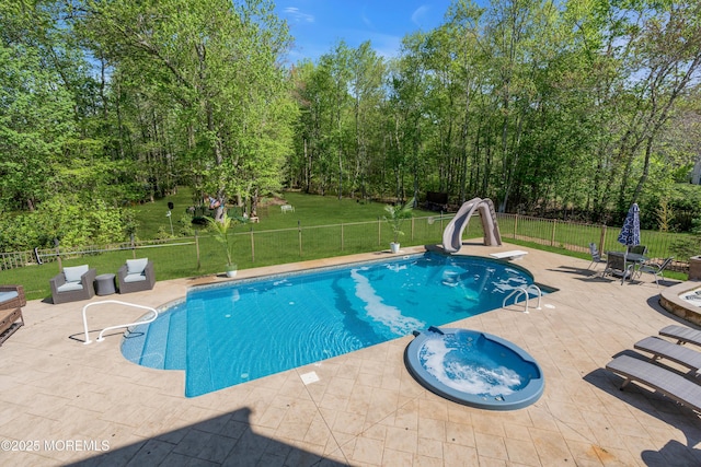 9 Mehar Ct, Jackson, NJ 08527 - view of pool with a patio, a water slide, a diving board, and a pool with connected hot tub