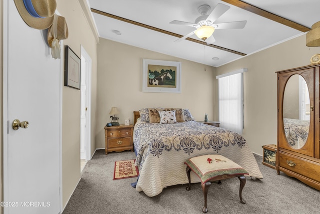 carpeted bedroom with vaulted ceiling and ceiling fan