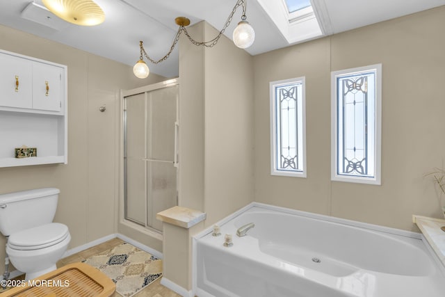 bathroom with toilet, tile patterned floors, shower with separate bathtub, and a skylight