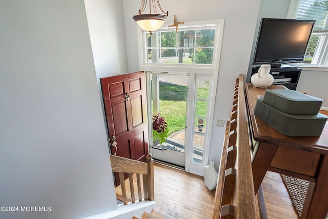 entryway featuring stairway and light wood-type flooring