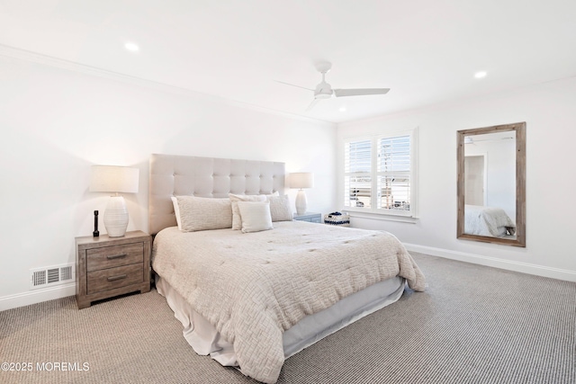 carpeted bedroom with crown molding and ceiling fan