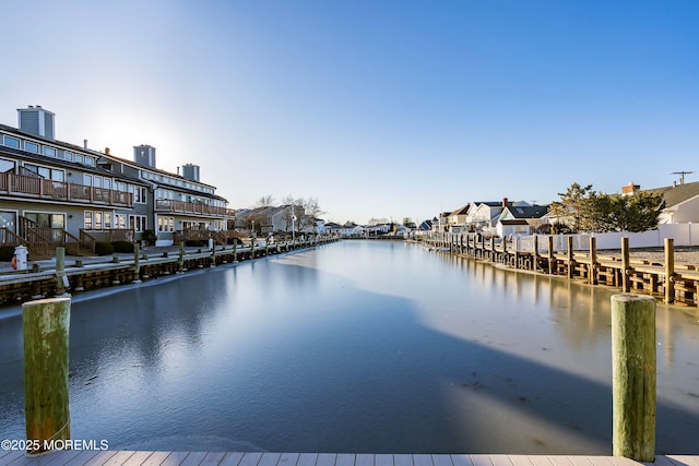 dock area featuring a water view