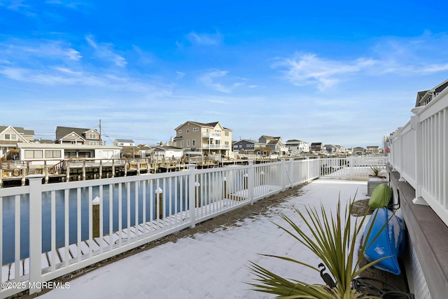 view of patio with a water view