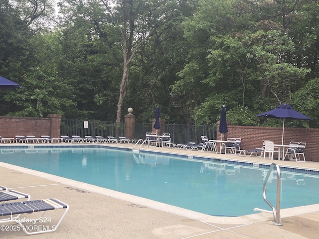327 Daniele Dr, Ocean Twp, NJ 07712 - community pool with a patio area