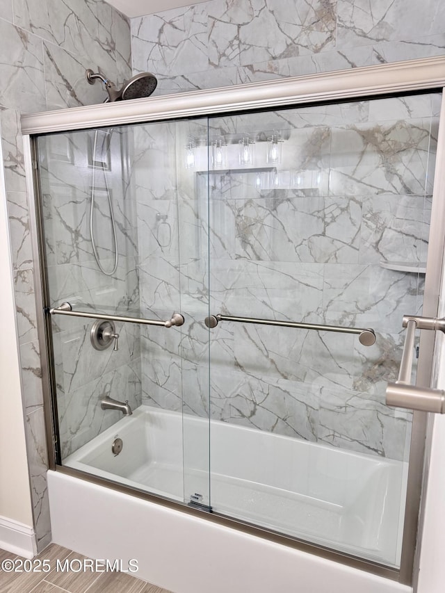 327 Daniele Dr, Ocean Twp, NJ 07712 - bathroom featuring combined bath / shower with glass door and wood finished floors