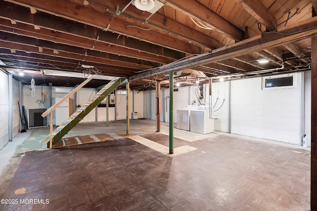 basement with separate washer and dryer