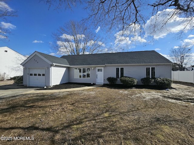 ranch-style house featuring a garage