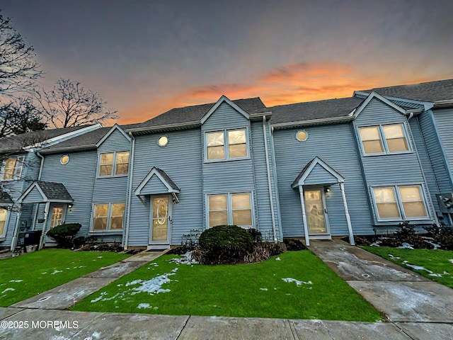 view of property with a lawn