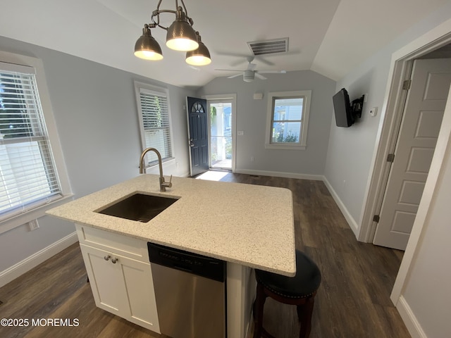 kitchen with sink, hanging light fixtures, white cabinets, a center island with sink, and stainless steel dishwasher