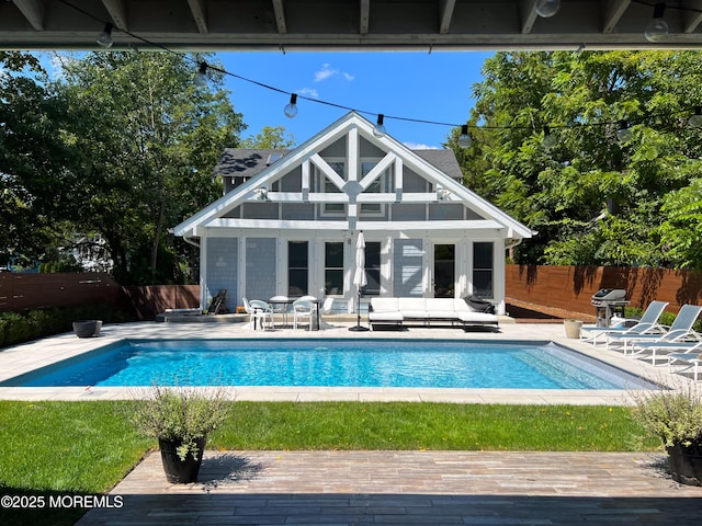 view of pool featuring an outdoor structure