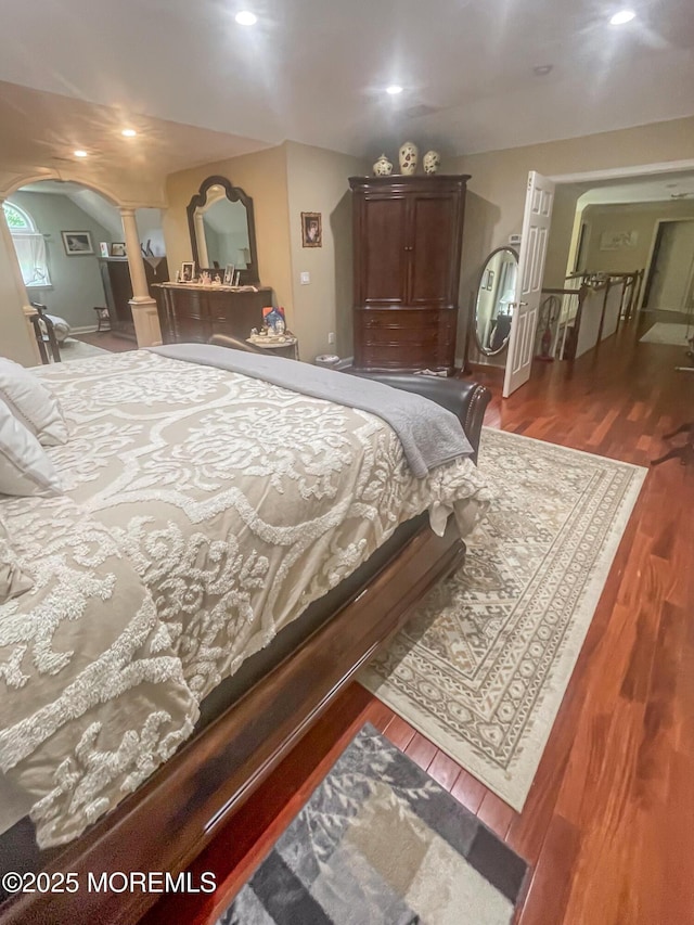 bedroom featuring dark hardwood / wood-style flooring