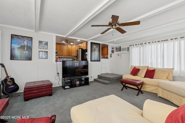 carpeted living room featuring beamed ceiling and ceiling fan