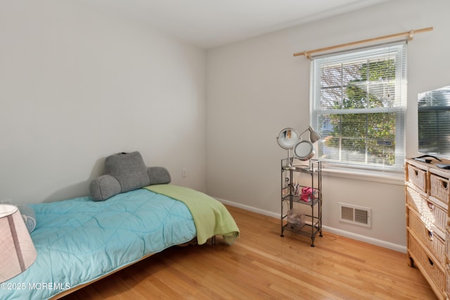 bedroom featuring light hardwood / wood-style flooring